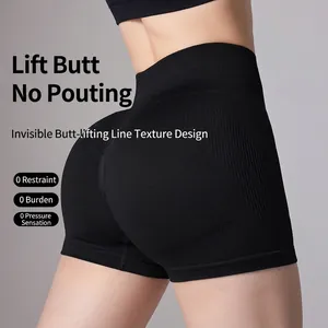 Seamless high-waisted yoga shorts in black with hip-lifting design for fitness training