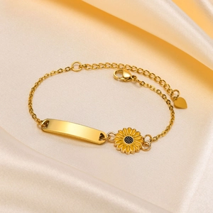 Golden stainless steel bracelet with sunflower charm and customizable plate on satin