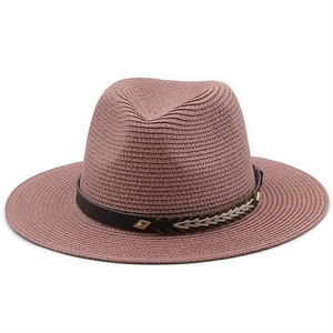 Detail of light mauve straw fedora featuring a dark brown leather band with metal rivets