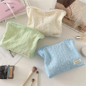 Détails des trousses à maquillage à paillettes en blanc, vert menthe et bleu