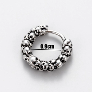Detail view of gothic skull hoop earring with 0.9cm inner diameter measurement