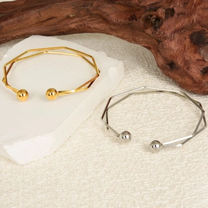 304 stainless steel adjustable open bangle with 18K gold plating and geometric faceted design