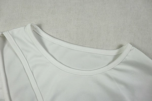 Detail of round neckline and stitching on a white knit elegant dress for women