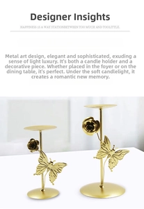 Detailed view of elegant gold metal candle holder with butterfly and rose floral accents