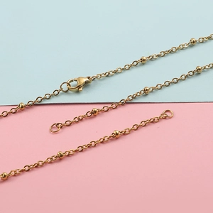 Gold stainless steel cross bead chain necklace with lobster clasp and extension chain