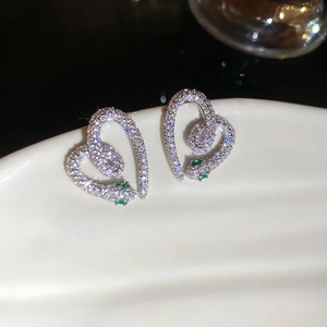 Snake-shaped heart earrings with white cubic zirconia and green gem accents for women