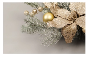 Macro detail of Christmas wreath featuring golden petals, frosted pine needles, and berries