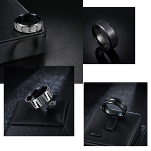 Macro view of four men's titanium steel rings with brushed finish and Roman numerals