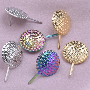 Macro shot of 304 stainless steel round stud earrings with hammer texture in three colors