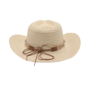 Detail of the woven texture and bohemian beads on the beige straw cowboy sun hat