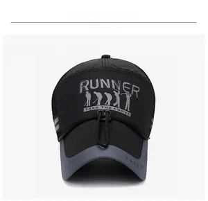 Front view of a mesh sun hat with adjustable cord and Runner graphic embroidery