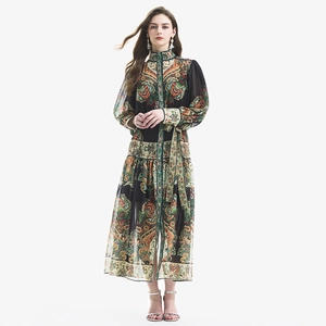 Retro paisley print maxi dress with lantern sleeves and waist tie on white background