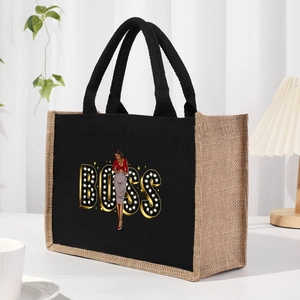 Close-up of black canvas tote bag with BOSS letter print and chic fashion illustration
