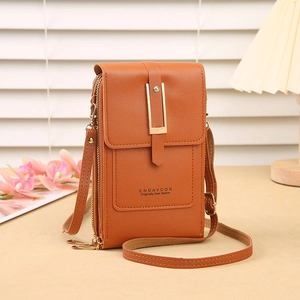 Detail view of brown faux leather phone bag with dual zippers and gold buckle strap