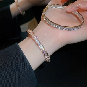 Detailed view of luxury zircon bracelets with triple-row crystals and rose gold finish