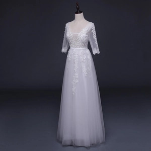 Elegant white lace V-neck evening gown with floral embroidery and tiered mesh A-line skirt
