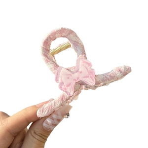 Pink checkered hair claw clip with sweet transparent bow accent for women's hairstyling