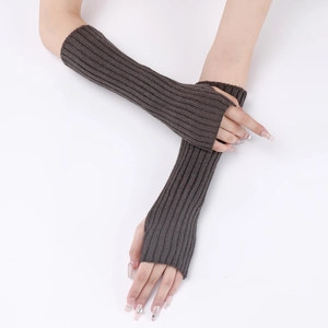 Close-up of dark coffee striped knit arm warmers showing texture and fingerless design