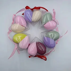 12-piece macaron beauty blender set in heart-shaped boxes with decorative ribbons