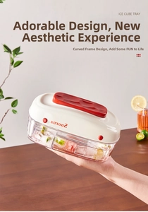 Close-up of dual-layer ice cube tray with fresh fruit cubes and easy release design