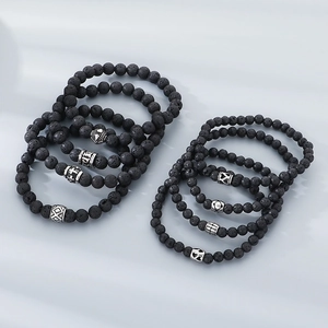Natural black volcanic stone beaded bracelets for men with silver engraved metal charms