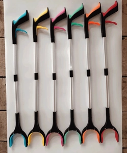 Detail showing foldable aluminum reacher grabber tools in six vibrant assorted colors