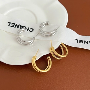 Minimalist double layer hoop earrings in polished gold and silver finishes