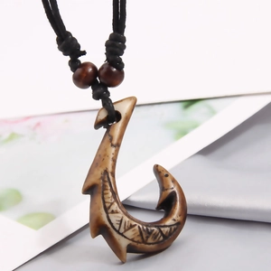 Tribal turtle resin fish hook pendant necklace with antique texture on black cord