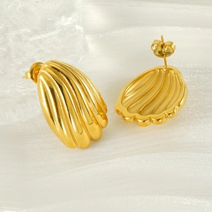 Chic 18k gold plated stainless steel shell stud earrings on white silk background