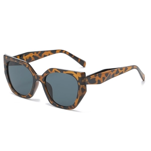 Vintage leopard print sunglasses with gray lenses shown from a 45-degree angle