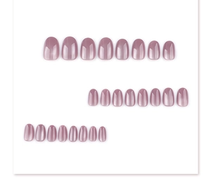 Short round dusty pink press-on nails set with 24 pieces in various sizes on white background