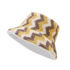 Plush reversible bucket hat with vintage wave patterns and warm fleece lining