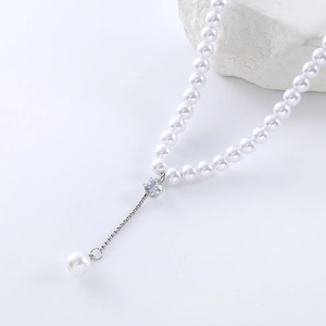 Elegant Y-shaped necklace with white freshwater pearls and zircon pendant in silver