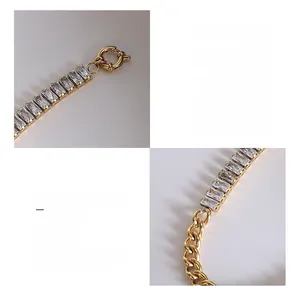 Detail of 18k gold plated titanium steel chain link with rectangular zircon pavé and clasp