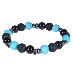 Detail showing natural sky blue turquoise and black lava rock beads on an elastic bracelet