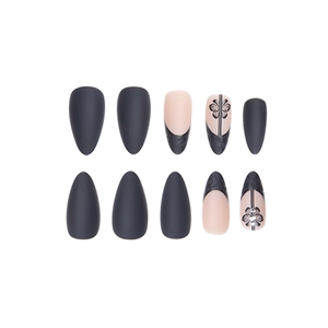 French minimalist almond press-on nails in matte black and nude with floral accents