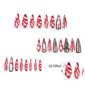 Gothic Halloween stiletto press-on nails with 3D metal spider and red blood splatter