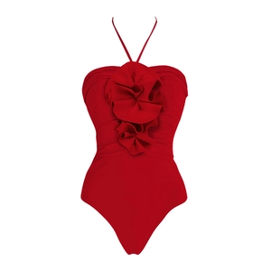 Detail of red halter swimsuit featuring a large 3D pleated floral ornament and slim fit design
