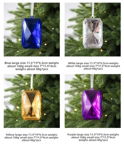 Detail view of large faceted acrylic gem ornaments in blue, gold, purple and white