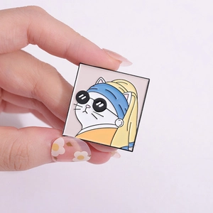 Square enamel brooch featuring a cute cartoon cat version of Girl with a Pearl Earring