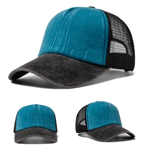 Detailed views of washed turquoise and grey mesh trucker hat with breathable fabric