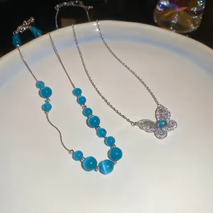 Elegant zircon butterfly pendant necklace and sky blue cat eye stone beaded jewelry set