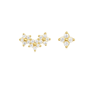 Vista macro dettagliata del set di orecchini a fiore in argento S925 con zirconi d'oro
