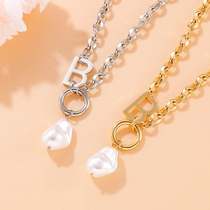 Vintage steel letter B necklaces with baroque pearls in gold and silver finishes