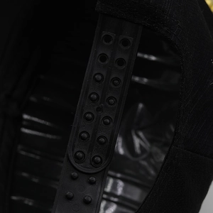 Detail shot of the adjustable black snapback closure on a stylish cotton baseball cap
