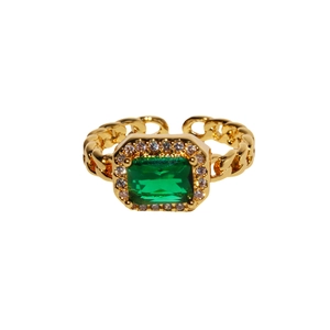 French vintage emerald-green zircon ring with gold chain band on white background