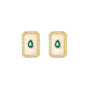 Close-up of 18K gold plated earrings with white mother-of-pearl and green zircon stones