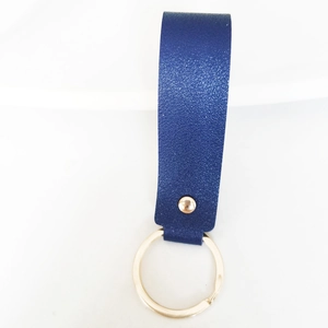 Deep blue leather keychain strap with premium gold metal ring and rivet detail