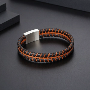 Men's woven leather bracelet with black and orange contrast design and silver magnetic clasp