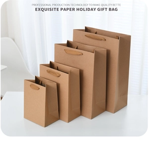 Detailed comparison of four sizes of premium brown kraft paper bags with flat handles